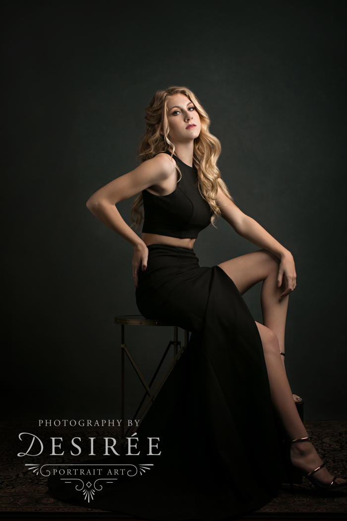 young woman in fashion pose for studio photos