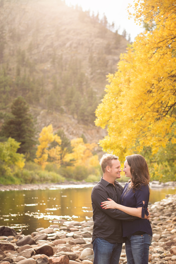 Portrait of a couple in the riverbed taken up the Poudre Canyon in Fort Collins