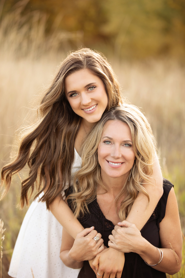 Gorgeous mother daughter portrait taken by Photography by Desiree in a field near Old Town