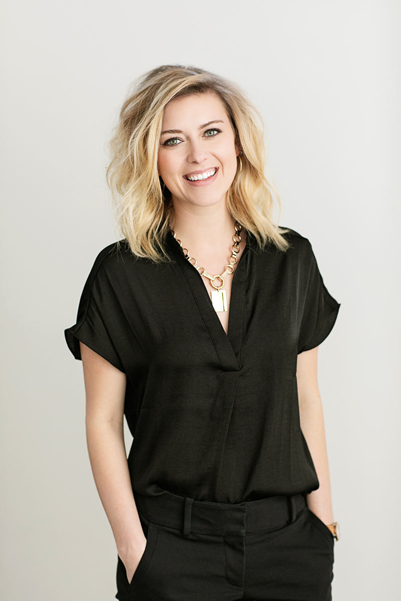 Modern business headshot photo of woman on white background,  smiling
